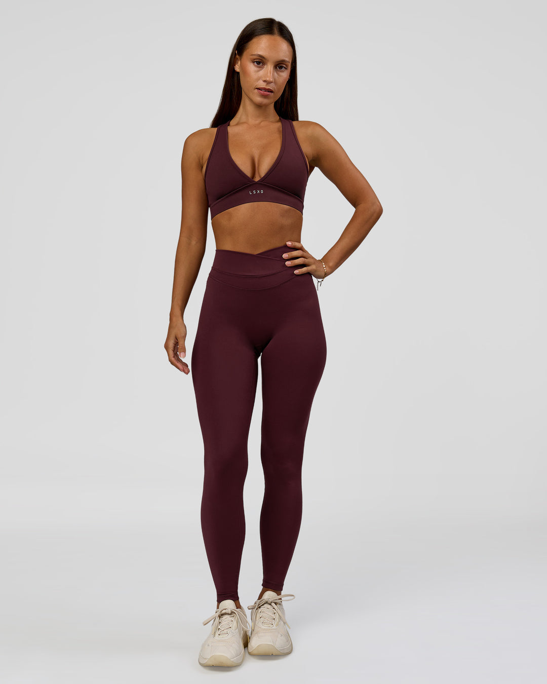 Woman wearing Stamina Sports Bra - Cherry Lacquer | Model:Brylee | Size:XS - view 5