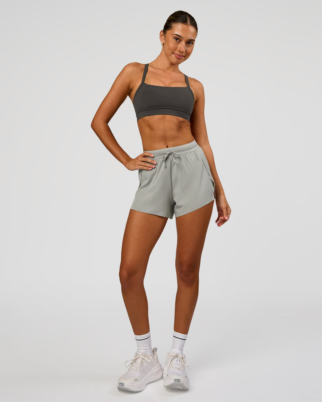 Woman wearing Accelerate 3" High-Rise Running Short - Alloy | Model:Charli | Size:XS - view 2