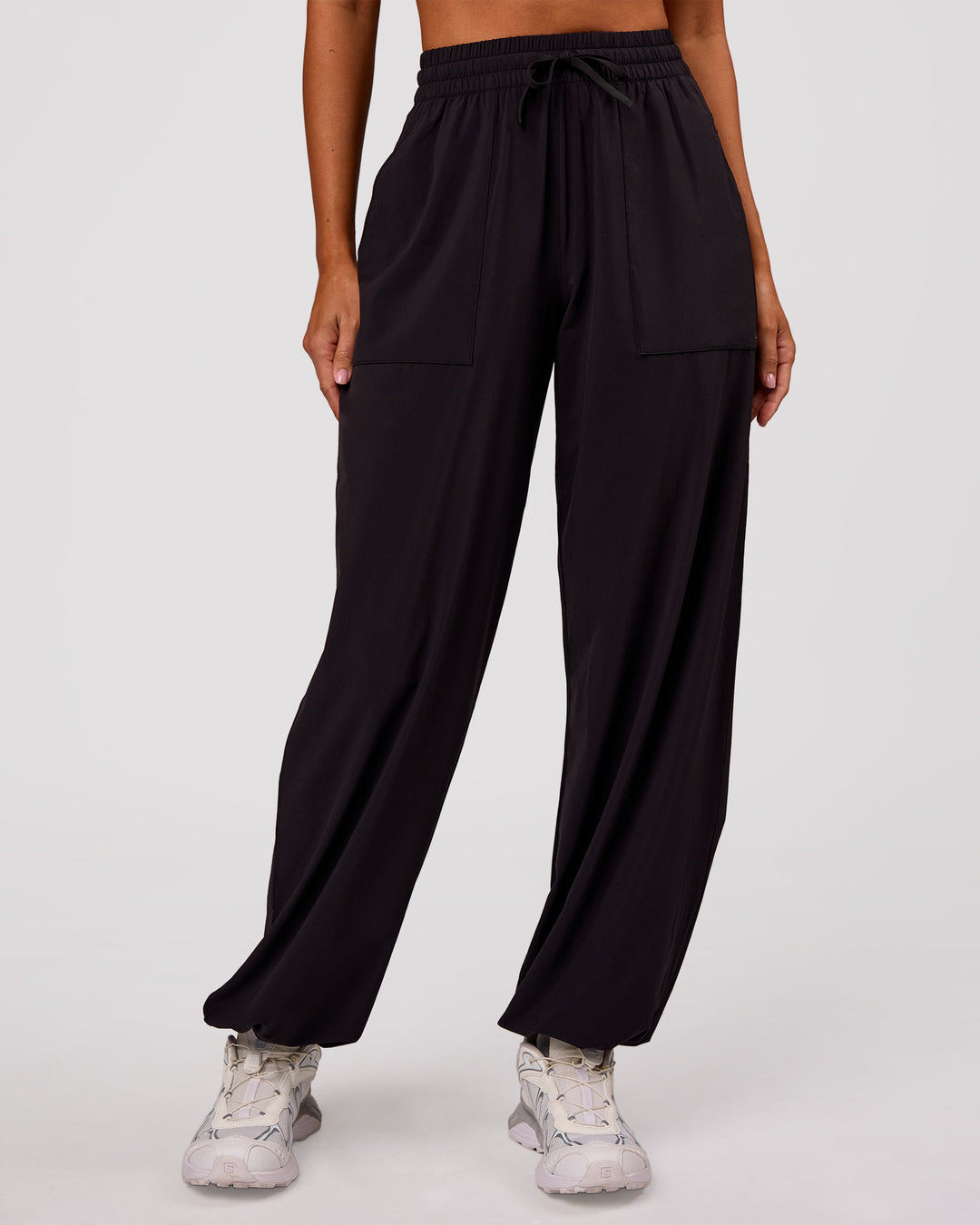 Woman wearing Bend Woven Pant - Black | Model:Charli | Size:XS - view 3
