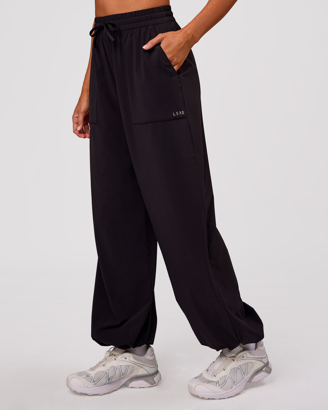Woman wearing Bend Woven Pant - Black | Model:Charli | Size:XS - view 8