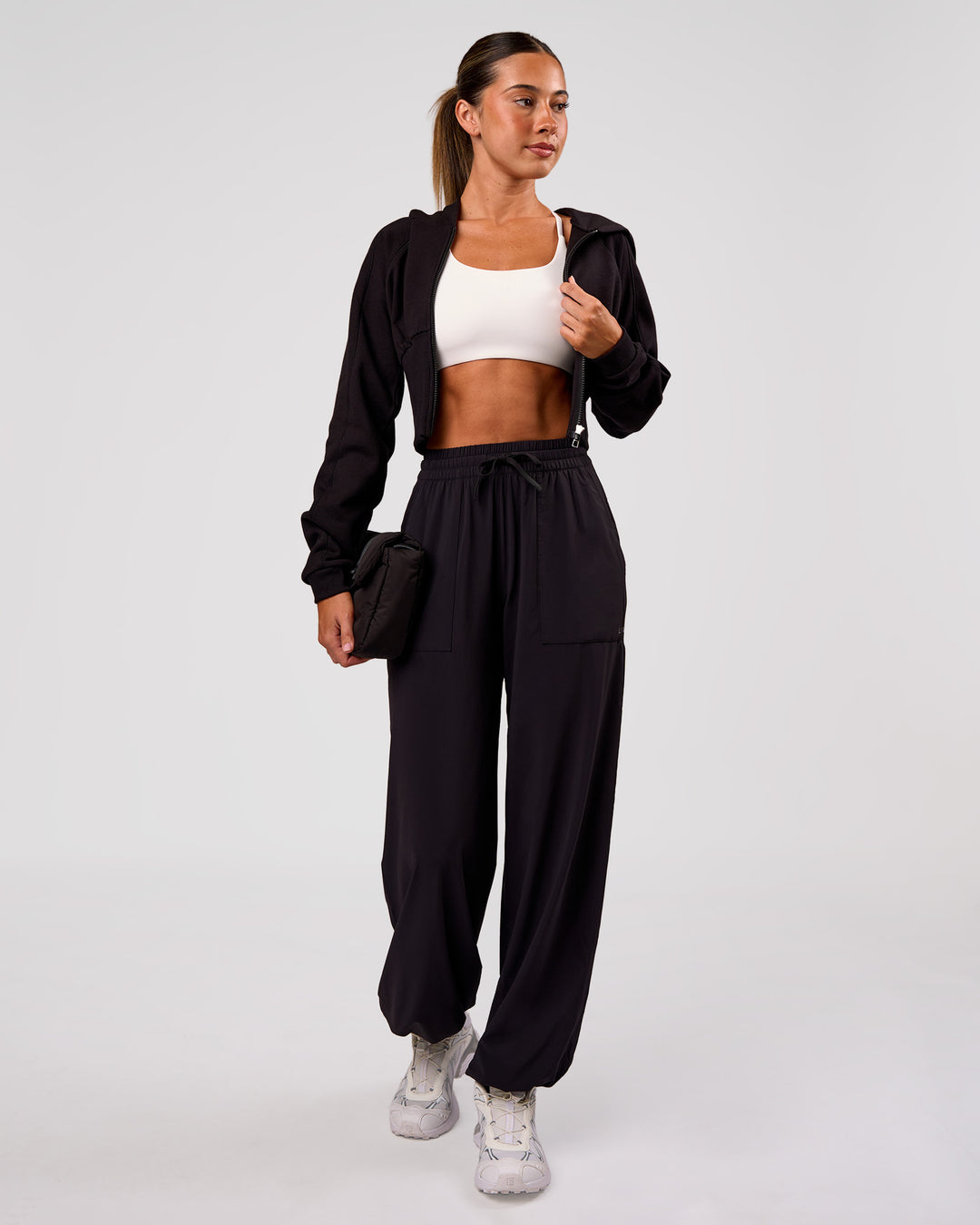 Woman wearing Bend Woven Pant - Black | Model:Charli | Size:XS - view 9
