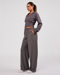 Woman wearing Bend Woven Pant - Duskstone | Model:Charli | Size:XS | Thumbnail Index: 0