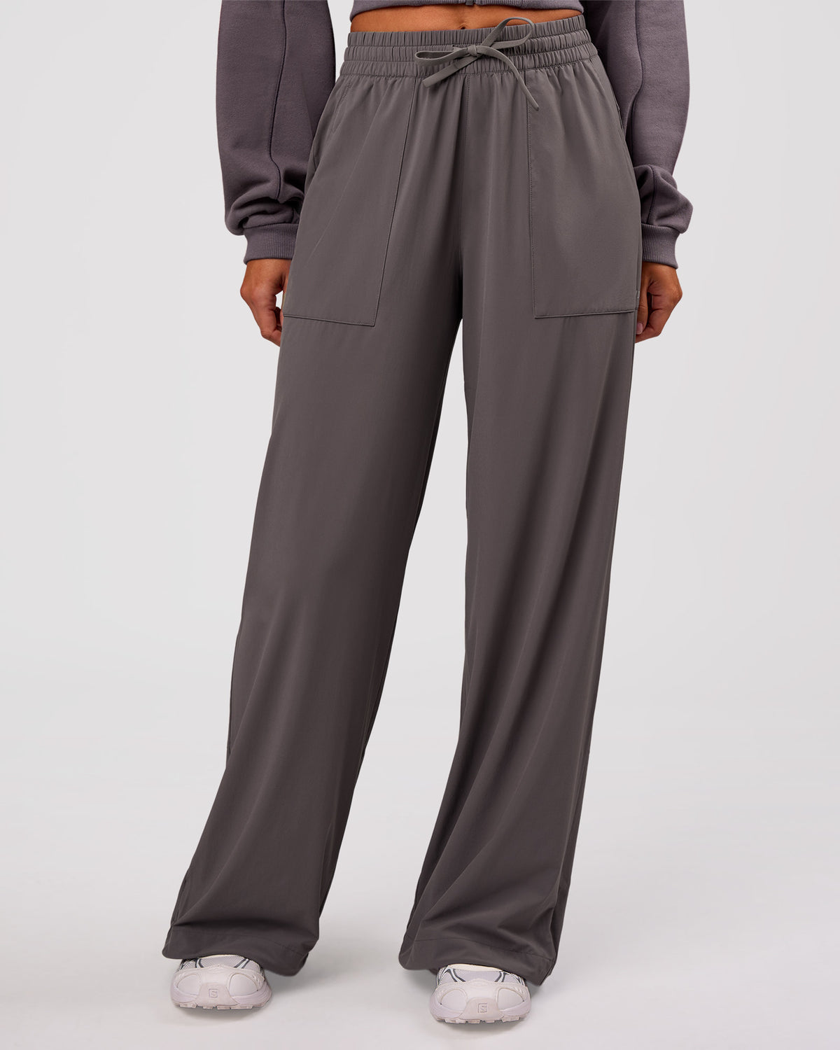 Woman wearing Bend Woven Pant - Duskstone | Model:Charli | Size:XS