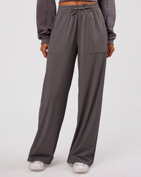 Woman wearing Bend Woven Pant - Duskstone | Model:Charli | Size:XS | Thumbnail Index: 1