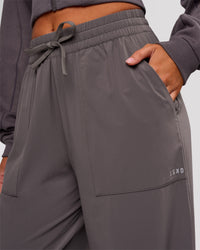 Woman wearing Bend Woven Pant - Duskstone | Model:Charli | Size:XS | Thumbnail Index: 5
