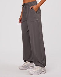 Woman wearing Bend Woven Pant - Duskstone | Model:Charli | Size:XS | Thumbnail Index: 8