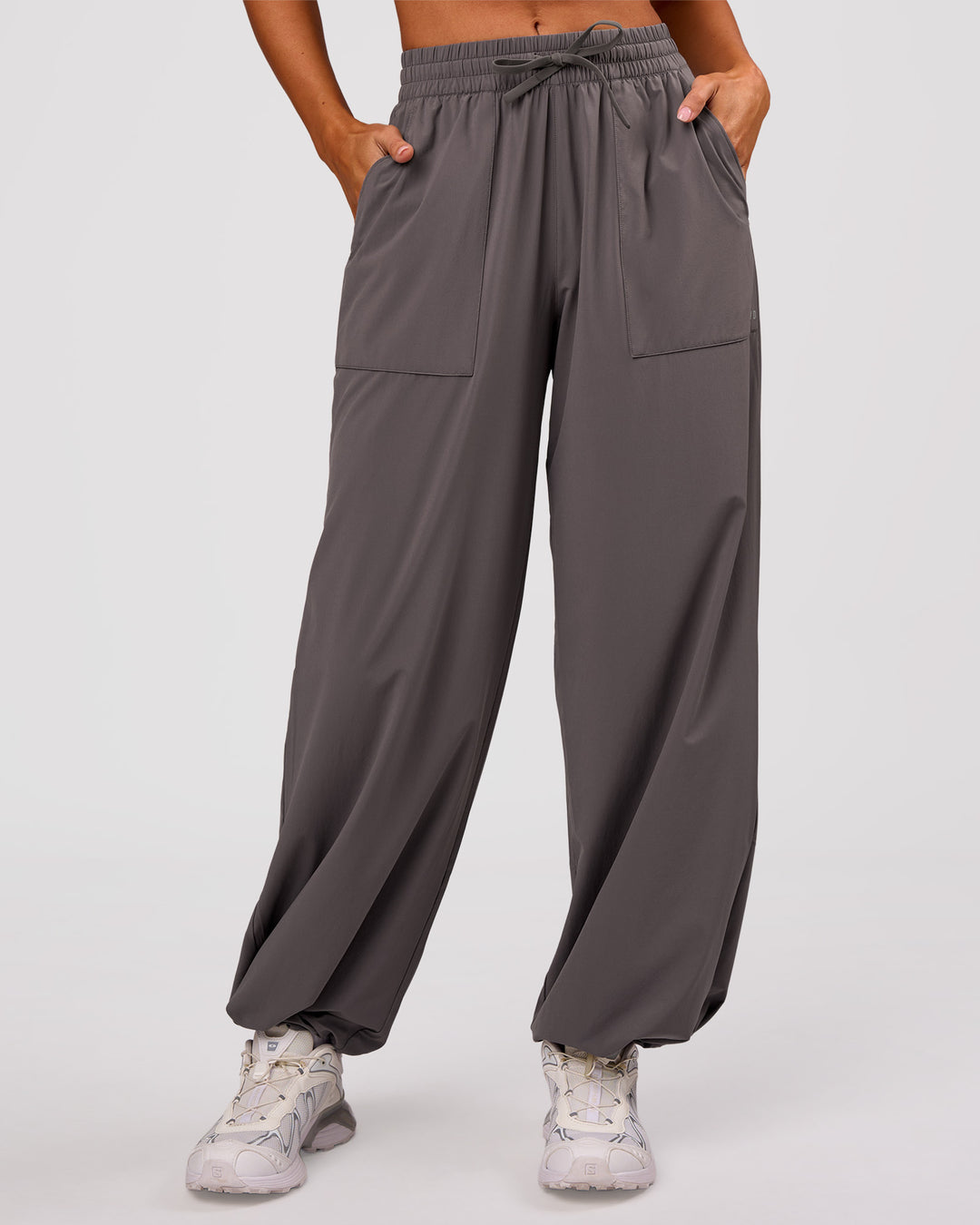 Woman wearing Bend Woven Pant - Duskstone | Model:Charli | Size:XS - view 10