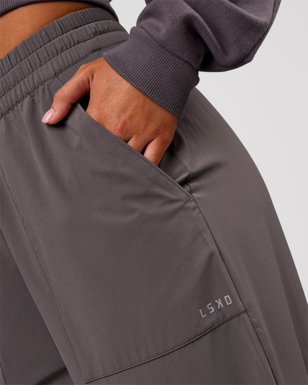 Woman wearing Bend Woven Pant - Duskstone | Model:Charli | Size:XS - view 13