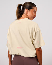 Woman wearing Bree Heavyweight Oversized Tee - Vanilla Bean | Model:Charli | Size:XS | Thumbnail Index: 21