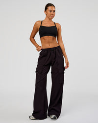 Woman wearing Endeavour Cargo Pant - Black | Model:Charli | Size:XS | Thumbnail Index: 8