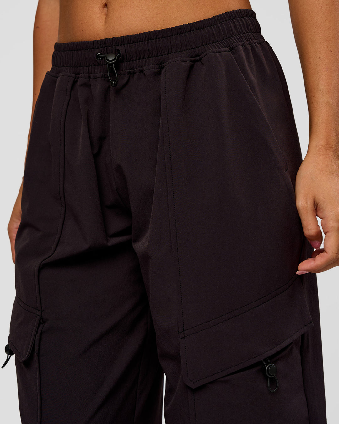 Woman wearing Endeavour Cargo Pant - Black | Model:Charli | Size:XS - view 5