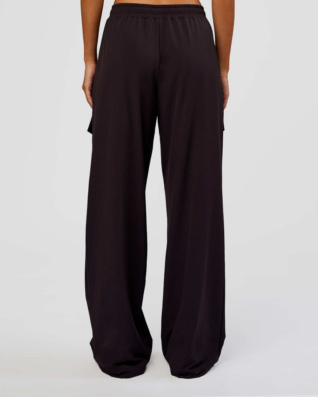 Woman wearing Endeavour Cargo Pant - Black | Model:Charli | Size:XS - view 6