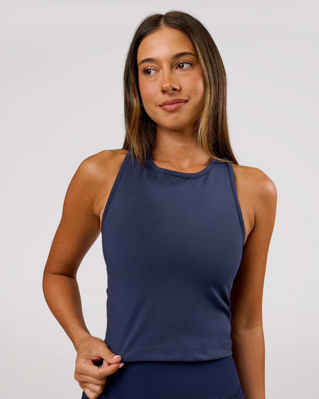 Woman wearing Flow Performance Tank 2.0 - Future Navy | Model:Charli | Size:XS - view 5