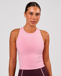 Woman wearing Flow Performance Tank 2.0 - Pink Rose | Model:Charli | Size:XS | Thumbnail Index: 0