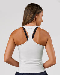 Woman wearing Flow Rep Scoop Neck Tank - White | Model:Charli | Size:XS | Thumbnail Index: 1