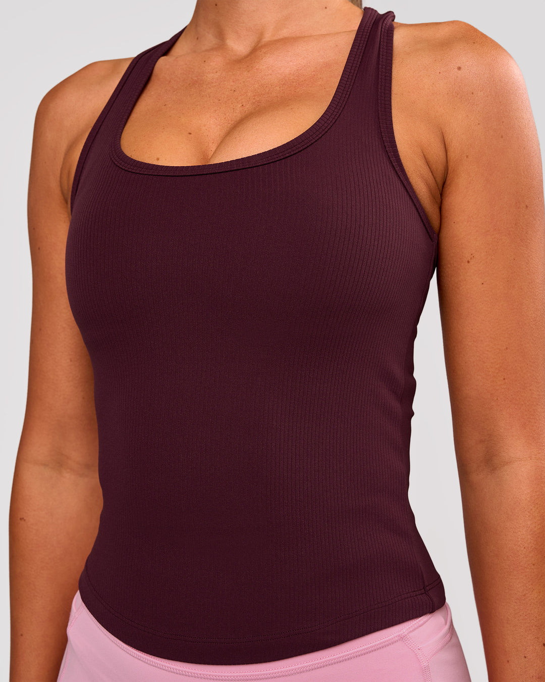 Woman wearing Flow Rib Scoop Neck Tank - Cherry Lacquer | Model:Charli | Size:XS - view 1