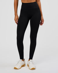 Woman wearing Fusion Bonded High-Rise Full Length Legging Pockets - Black | Model:Charli | Size:XS | Thumbnail Index: 0