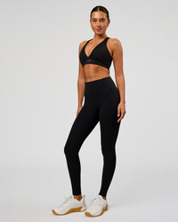 Woman wearing Fusion Bonded High-Rise Full Length Legging Pockets - Black | Model:Charli | Size:XS | Thumbnail Index: 1