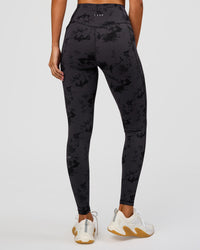Woman wearing Fusion Ultra High-Rise Full Length Legging Pockets - Black Tie Dye | Model:Charli | Size:XS | Thumbnail Index: 10