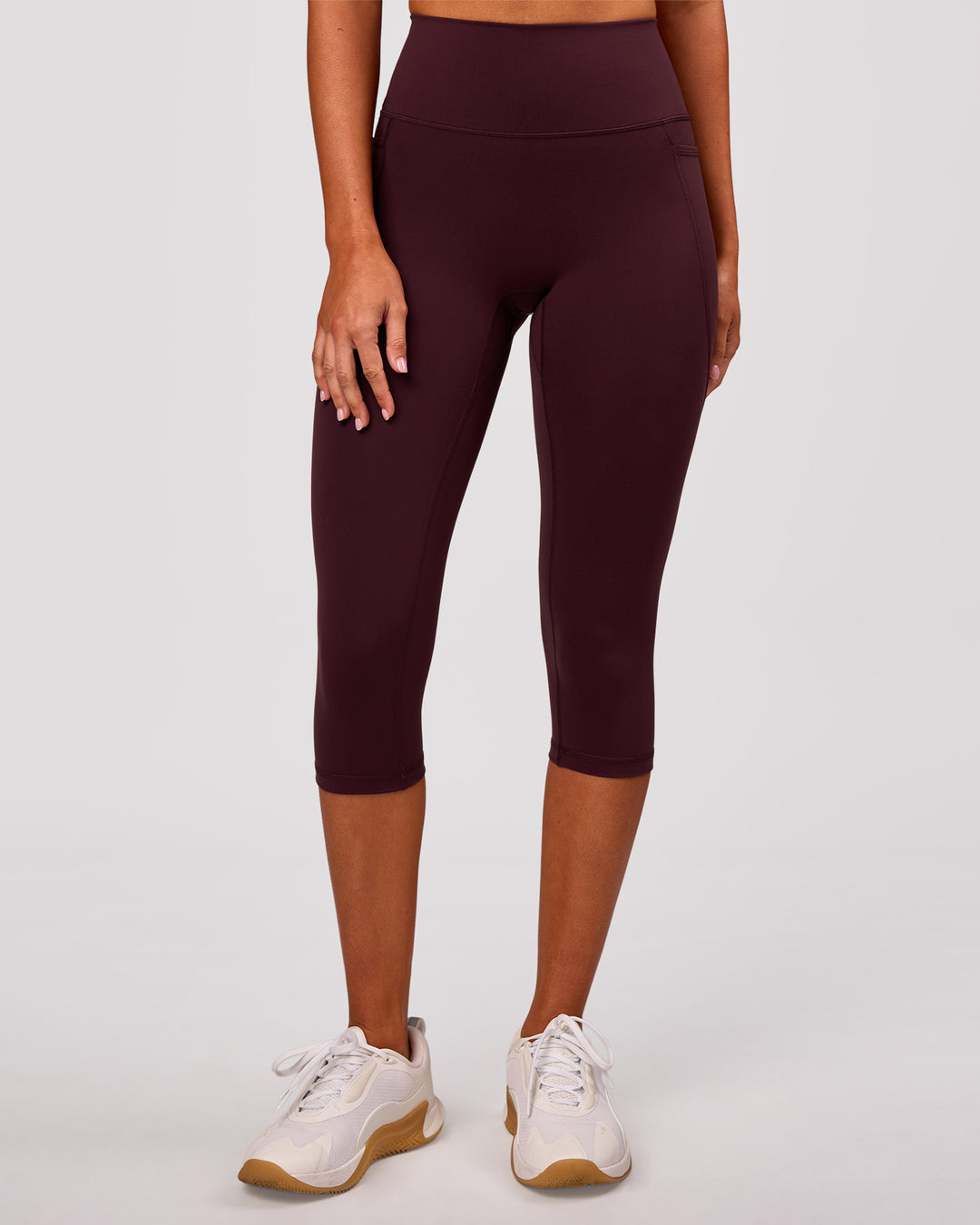 Woman wearing Fusion V Contour Ultra High-Rise 3/4 Legging Pockets - Cherry Lacquer | Model:Charli | Size:XS - view 4