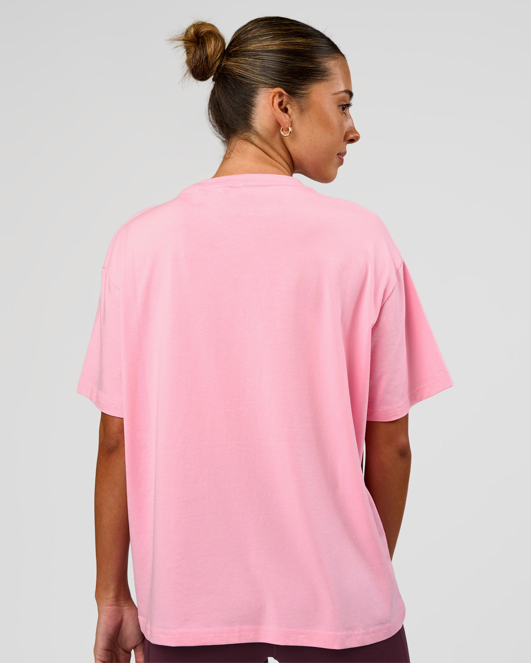 Woman wearing Go-To FLXCotton Oversized Tee - Pink Rose-White | Model:Charli | Size:XS - view 2