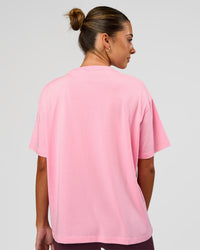 Woman wearing Go-To FLXCotton Oversized Tee - Pink Rose-White | Model:Charli | Size:XS | Thumbnail Index: 1