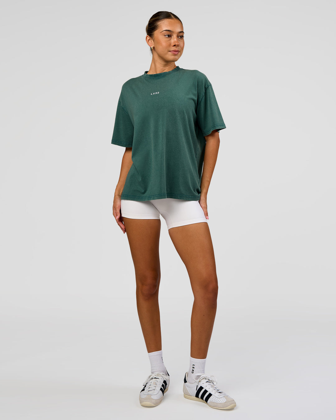 Woman wearing Go-To FLXCotton Oversized Tee - Transformative Teal Washed-White | Model:Charli | Size:XS - view 2
