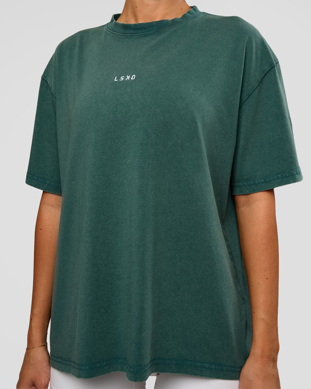 Woman wearing Go-To FLXCotton Oversized Tee - Transformative Teal Washed-White | Model:Charli | Size:XS - view 3