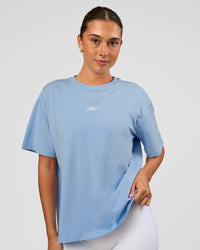 Woman wearing Go-To Script FLXCotton Oversized Tee - Open Air | Model:Charli | Size:XS | Thumbnail Index: 0