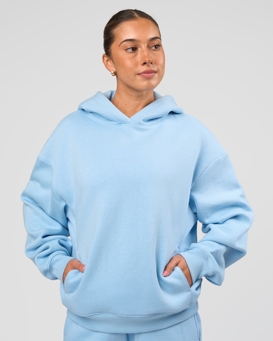 Woman wearing Go-To Script Oversized Hoodie - Open Air | Model:Charli | Size:XS - view 1