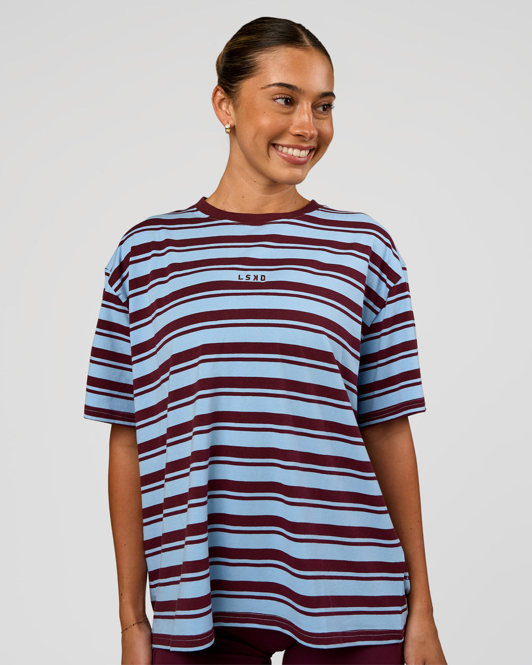 Woman wearing Go-To Shadow Stripe FLXCotton Oversized Tee - Open Air-Cherry Lacquer | Model:Charli | Size:XS - view 1