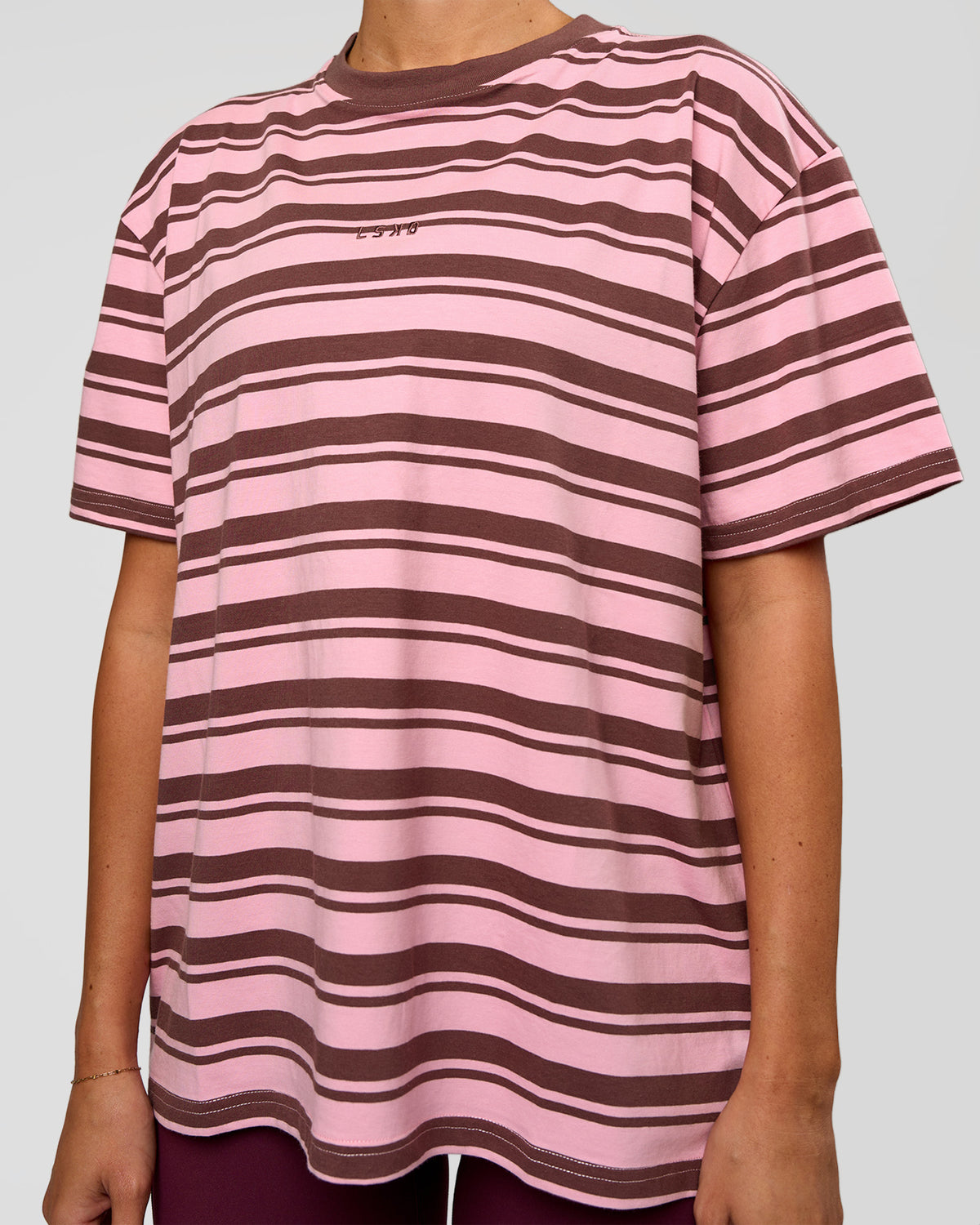 Woman wearing Go-To Shadow Stripe FLXCotton Oversized Tee - Pink Rose-Cocoa Powder | Model:Charli | Size:XS