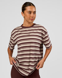 Woman wearing Go-To Shadow Stripe FLXCotton Oversized Tee - Shale Beige-Hot Chocolate | Model:Charli | Size:XS | Thumbnail Index: 0
