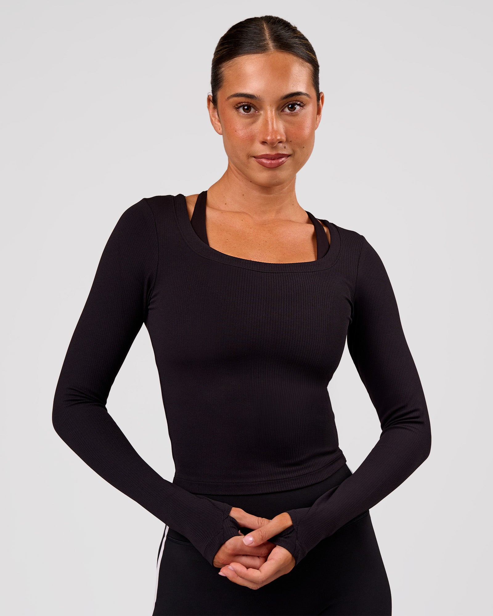 Woman wearing Horizon Long Sleeve Tee - Black | Model:Charli | Size:XS