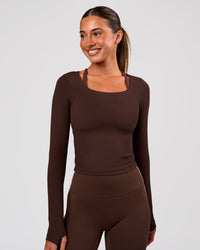 Woman wearing Horizon Long Sleeve Tee - Hot Chocolate | Model:Charli | Size:XS | Thumbnail Index: 1