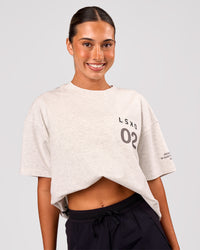 Woman wearing Hybrid Elements Heavyweight FLXCotton Oversized Tee  - Silver Marl | Model:Charli | Size:XS | Thumbnail Index: 1