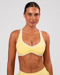 Woman wearing Luminous Sports Bra - Lemon-White | Model:Charli | Size:XS | Thumbnail Index: 7