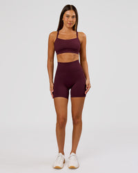 Woman wearing Momentum Sports Bra D/DD/E - Cherry Lacquer | Model:Charli | Size:XS | Thumbnail Index: 4