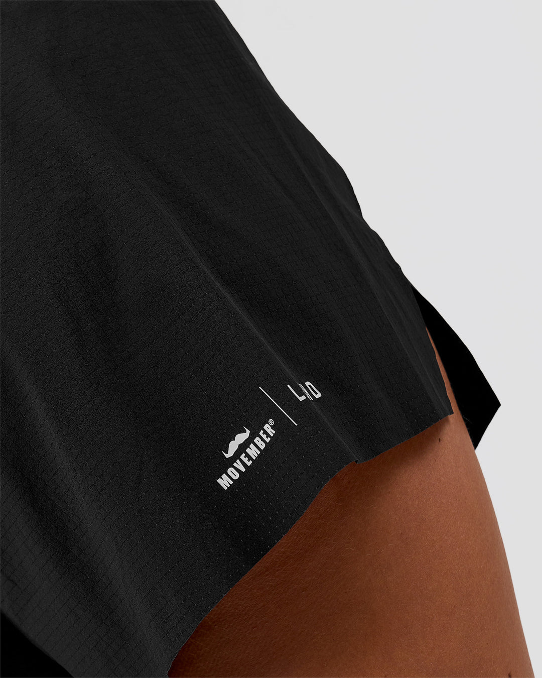 Woman wearing Movember x LSKD Accelerate 3" High-Rise Running Short - Black | Model:Charli | Size:XS - view 11