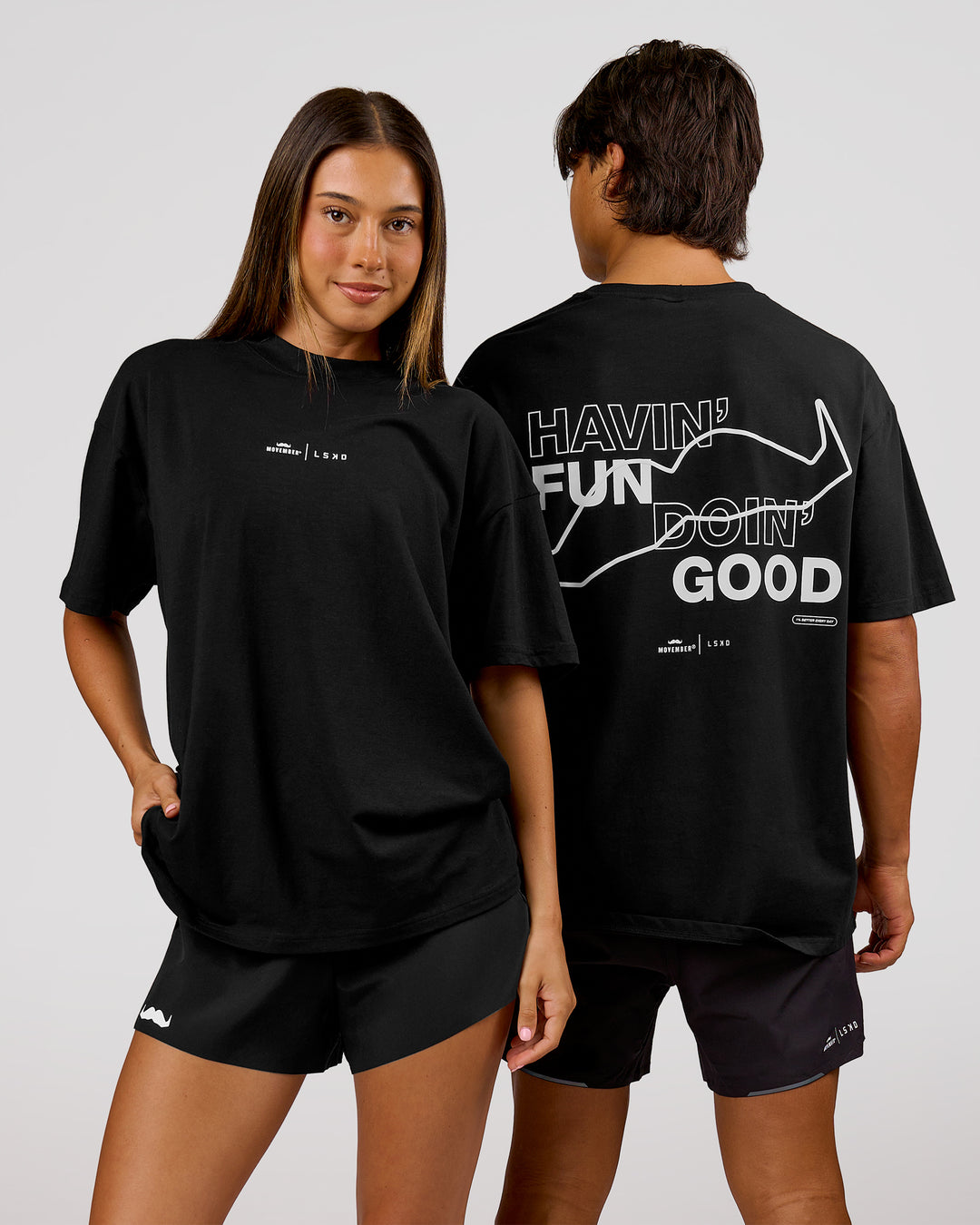Woman wearing Movember x LSKD FLXCotton Oversize Tee - Black-White | Model:Charli | Size:XS - view 2