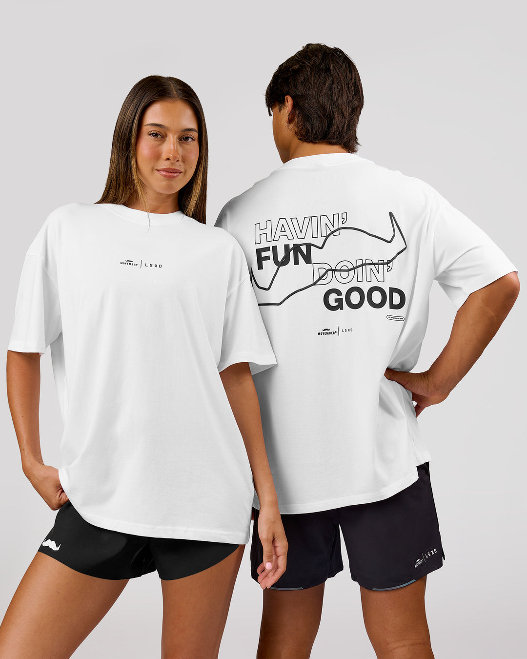 Woman wearing Movember x LSKD FLXCotton Oversize Tee - White-Black | Model:Charli | Size:XS - view 2