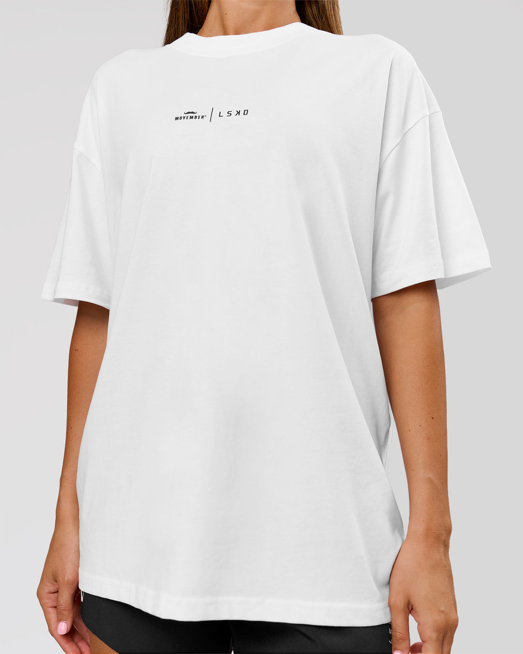 Woman wearing Movember x LSKD FLXCotton Oversize Tee - White-Black | Model:Charli | Size:XS - view 10