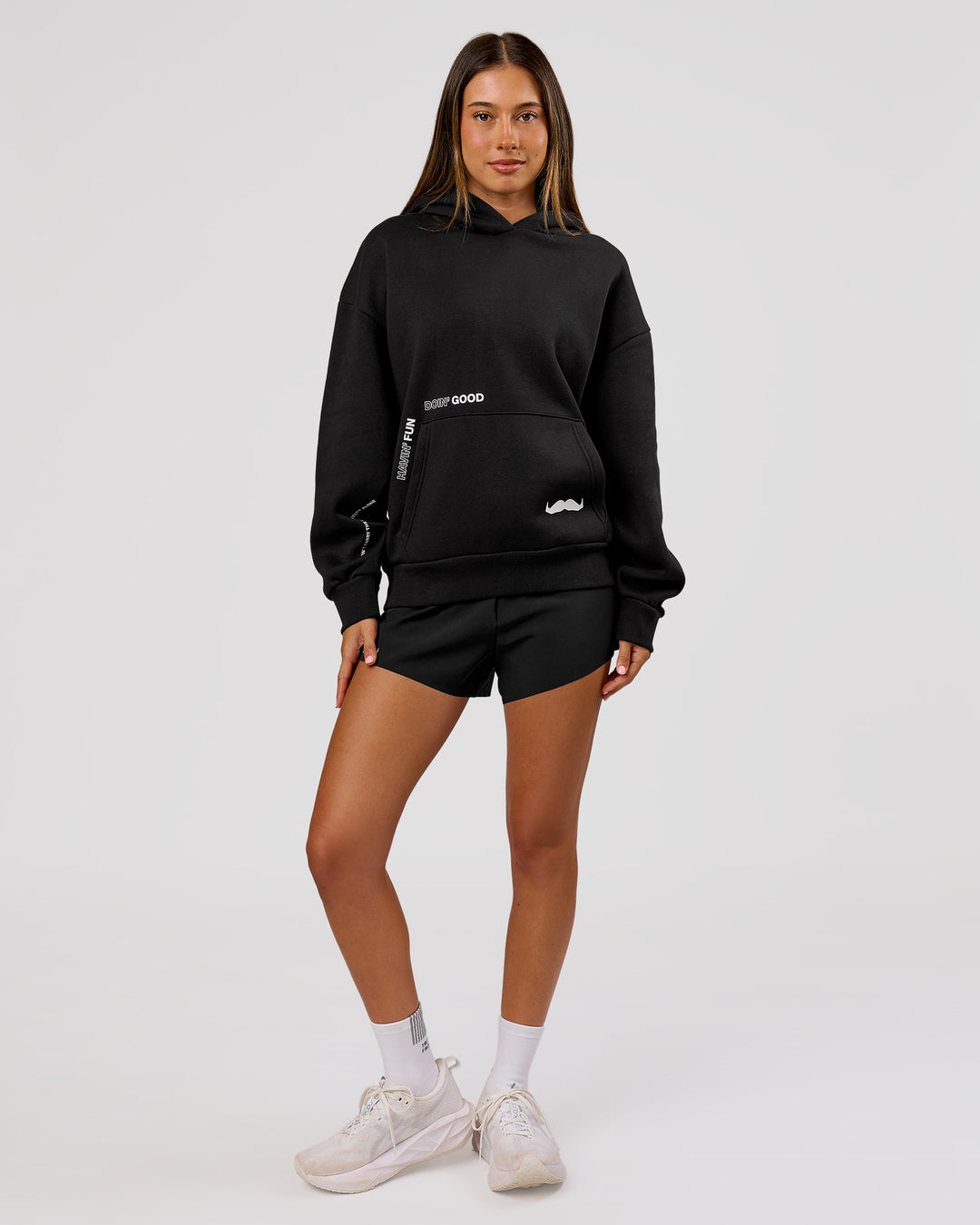 Woman wearing Movember x LSKD Oversized Hoodie - Black | Model:Charli | Size:XS - view 8