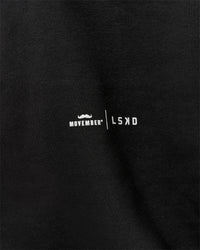 Woman wearing Movember x LSKD Oversized Hoodie - Black | Model:Charli | Size:XS | Thumbnail Index: 15