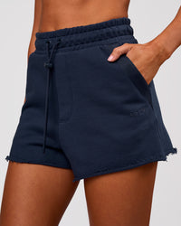 Woman wearing MVP Elite Terry Short - Future Navy | Model:Charli | Size:XS | Thumbnail Index: 6