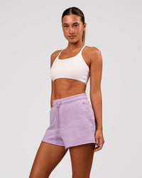 Woman wearing MVP Elite Terry Short - Pale Lilac | Model:Charli | Size:XS | Thumbnail Index: 0