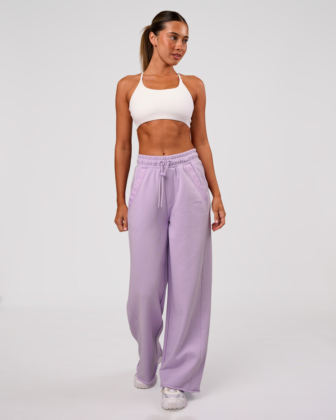 Woman wearing MVP Elite Terry Wide Leg Pant - Pale Lilac | Model:Charli | Size:XS - view 2