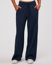 Woman wearing MVP Elite Terry Wide Leg Pant - Future Navy | Model:Charli | Size:XS | Thumbnail Index: 0