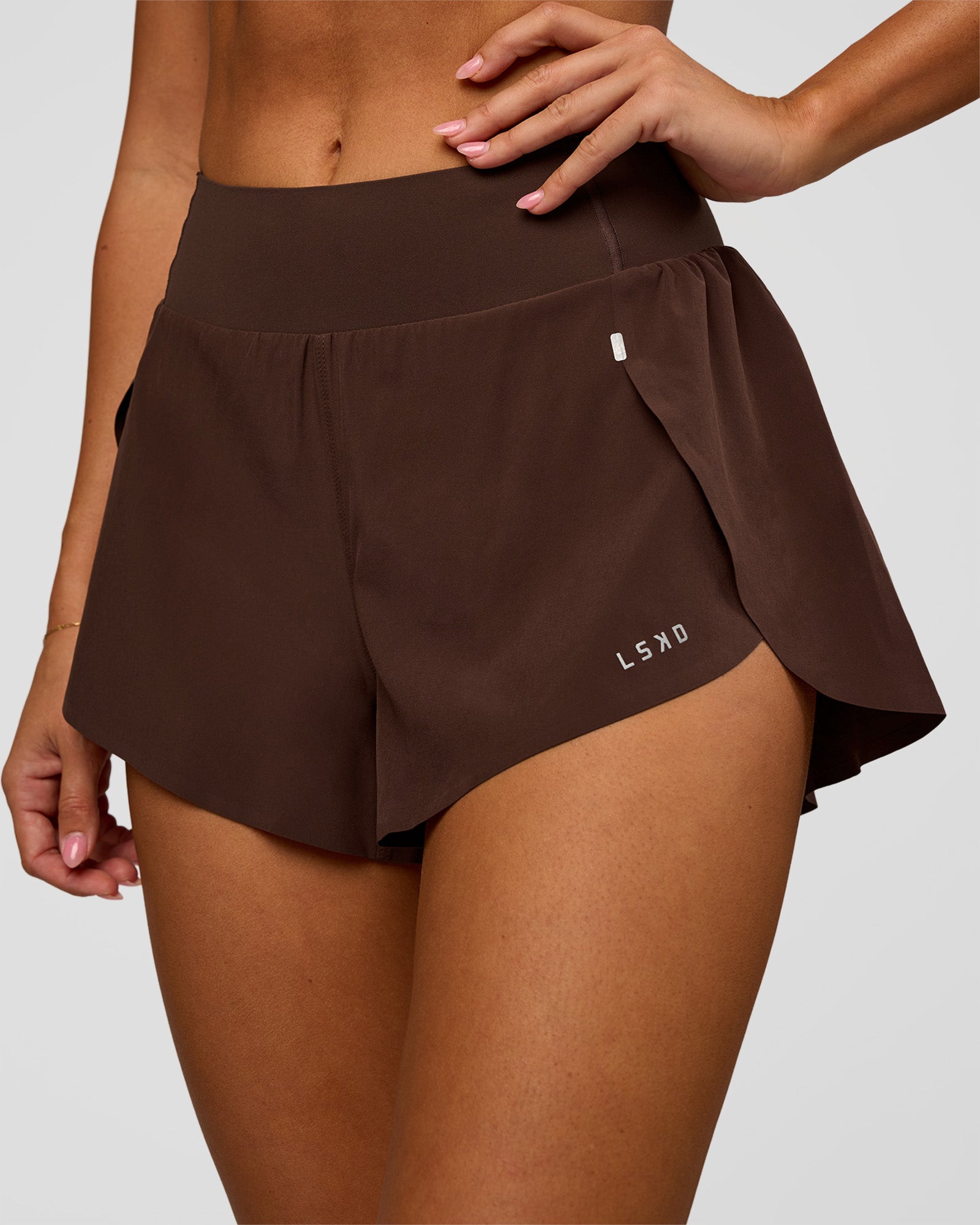 Woman wearing Pacer 3" Run Short - Hot Chocolate | Model:Charli | Size:XS