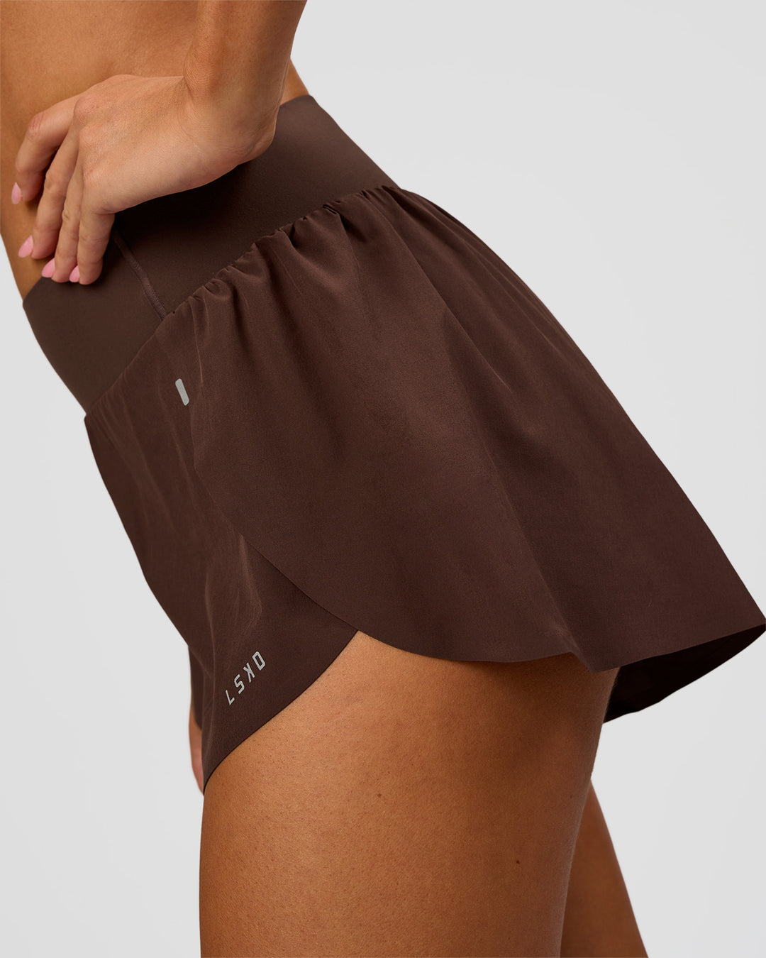 Woman wearing Pacer 3" Run Short - Hot Chocolate | Model:Charli | Size:XS - view 4